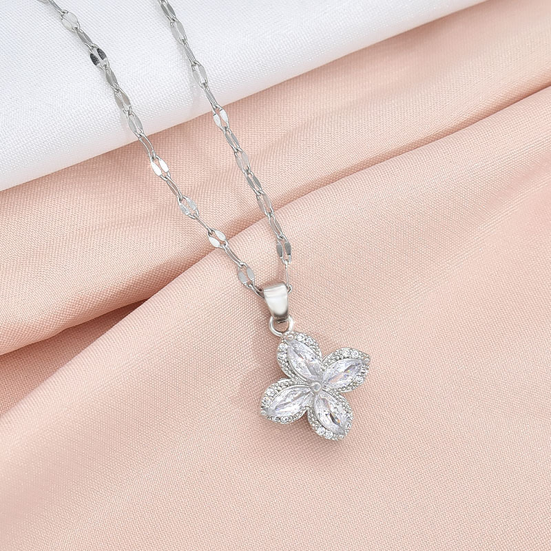 Stylish Rotatable Titanium Steel Four-Petal Flower Necklace with Zircon-Inlaid Ring Earrings for Women - Image 10