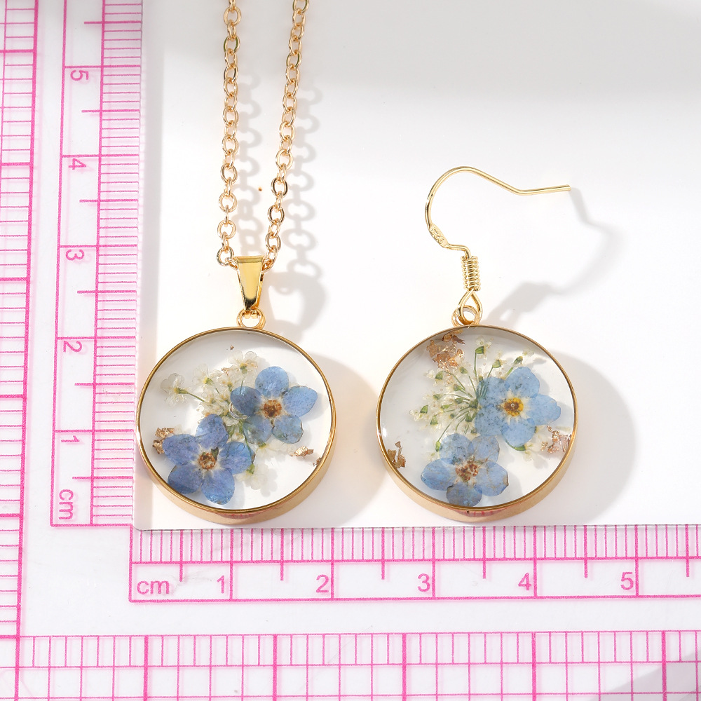 Stylish Transparent Epoxy Floral Necklace and Earring Set - Image 11