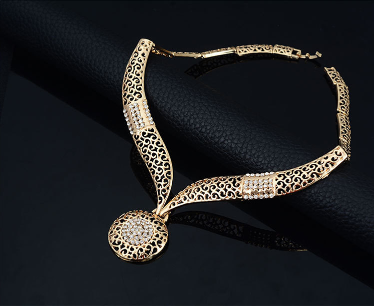 Elegant Four-Piece Jewelry Set: Necklace, Earrings, and Ring Collection - Image 6