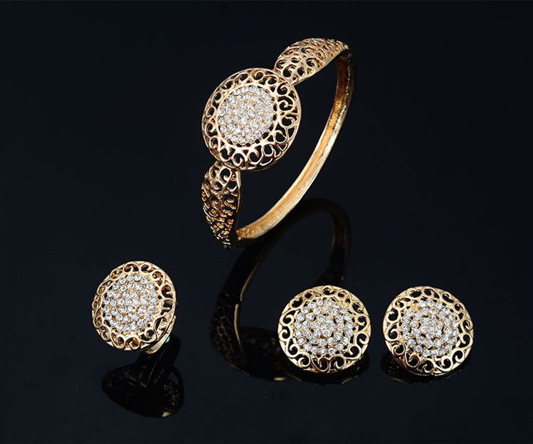 Elegant Four-Piece Jewelry Set: Necklace, Earrings, and Ring Collection - Image 7