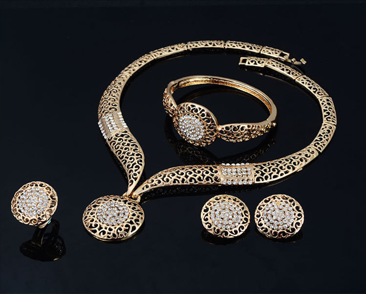 Elegant Four-Piece Jewelry Set: Necklace, Earrings, and Ring Collection - Image 8