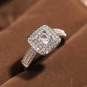 Timeless Four-Claw Round Zircon Engagement Ring for Lasting Love