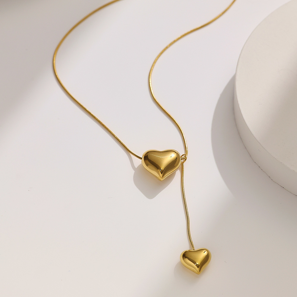 Elegant Stainless Steel Necklace with Simple Peach Heart Chain Design - Image 3