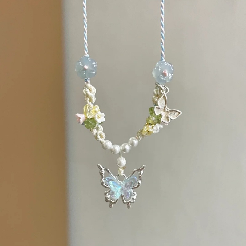 Elegant Women's Crystal Blue Butterfly Necklace - Hand-Knitted Rope Accessory - Image 2