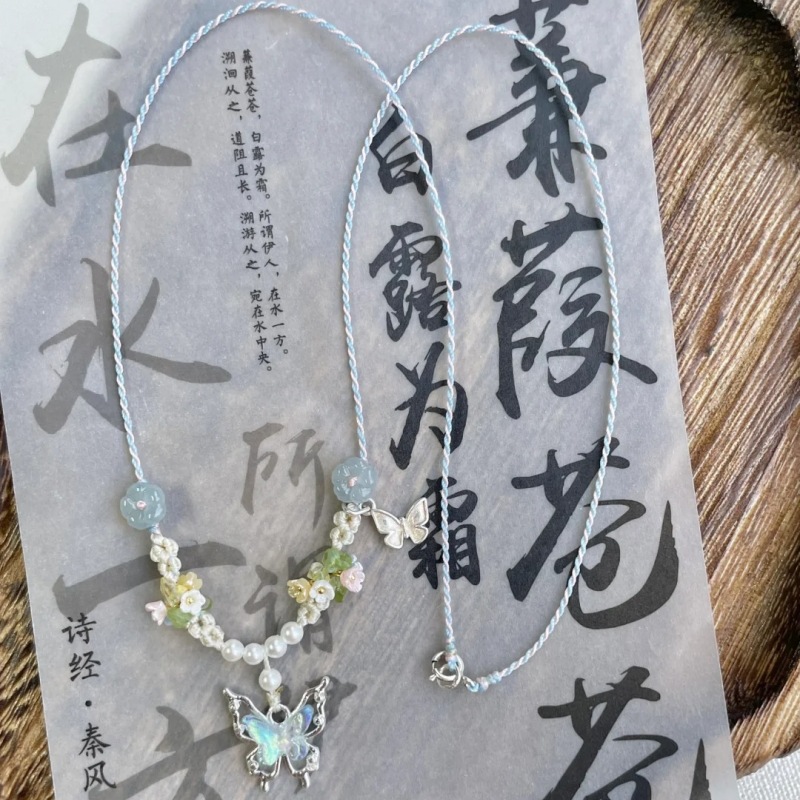 Elegant Women's Crystal Blue Butterfly Necklace - Hand-Knitted Rope Accessory - Image 5