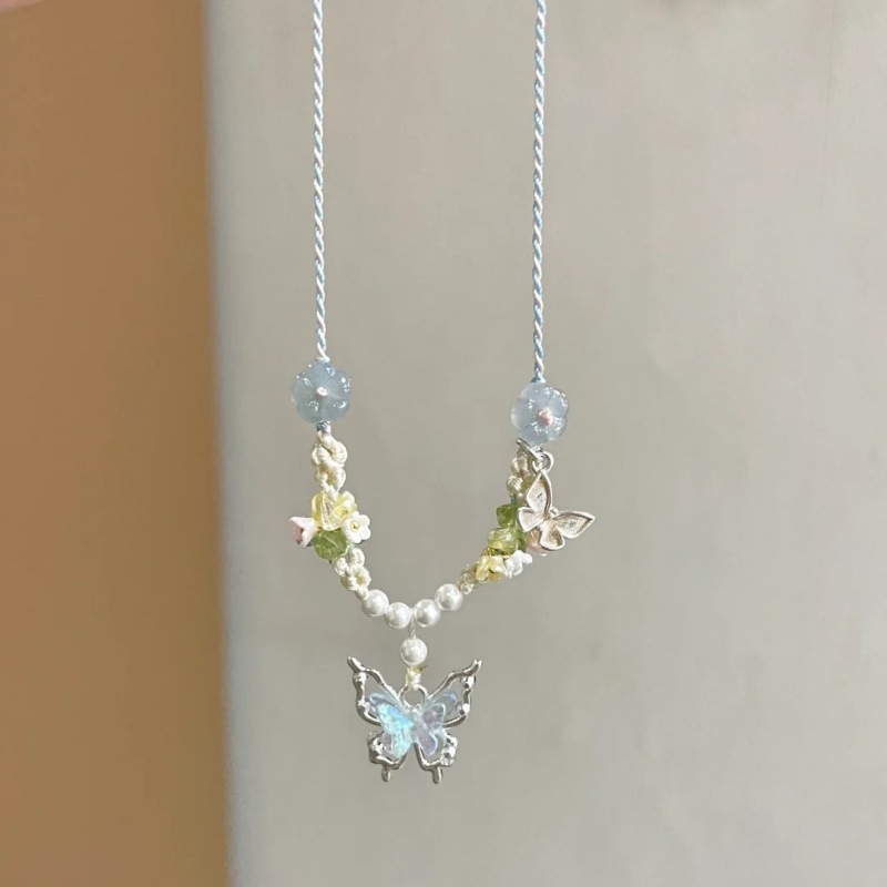 Elegant Women's Crystal Blue Butterfly Necklace - Hand-Knitted Rope Accessory - Image 9