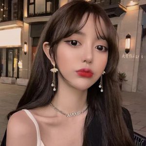 Elegant Ballet Women's Long Pearl Earrings for Timeless Style