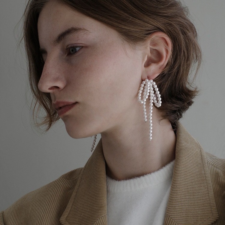 Chic Silver Woven Earrings with Elegant Bowknot and Pearl Accents - Image 9