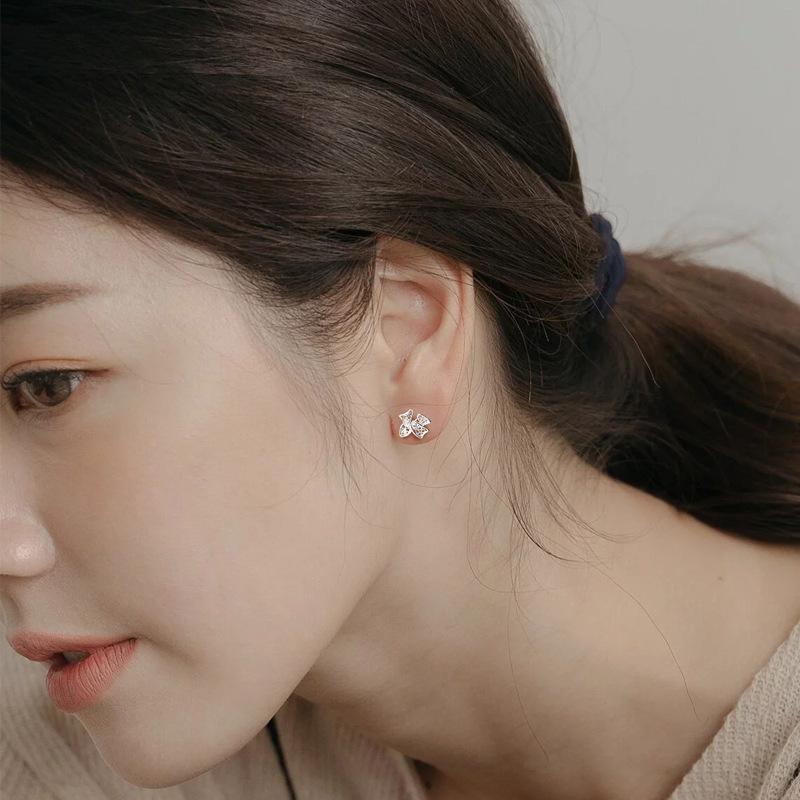 Bow Otica Women's Stud Earrings - Sweet Fresh Screw Hollow Filament Ornament for Ear Care - Image 3