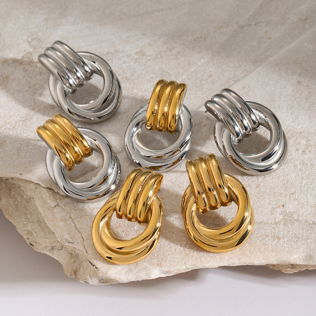 Trendy Stainless Steel Earrings with 18K Gold Winding Design - Image 2