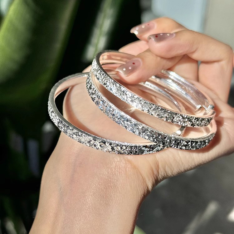 Elegant Women's Silver Bracelet with Simple Starry Sky Design