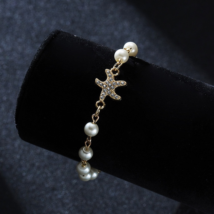 Adjustable Multi-Style Hollow Rhinestone Pearl Bracelet for Every Occasion - Image 19