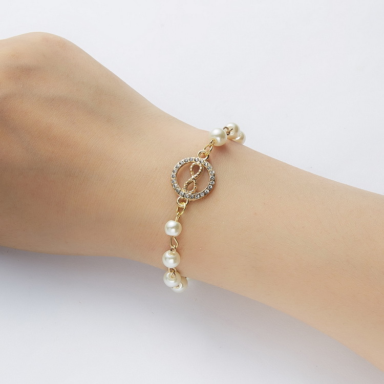Adjustable Multi-Style Hollow Rhinestone Pearl Bracelet for Every Occasion - Image 22