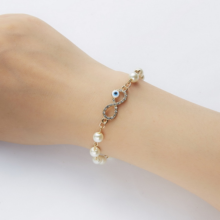Adjustable Multi-Style Hollow Rhinestone Pearl Bracelet for Every Occasion - Image 25