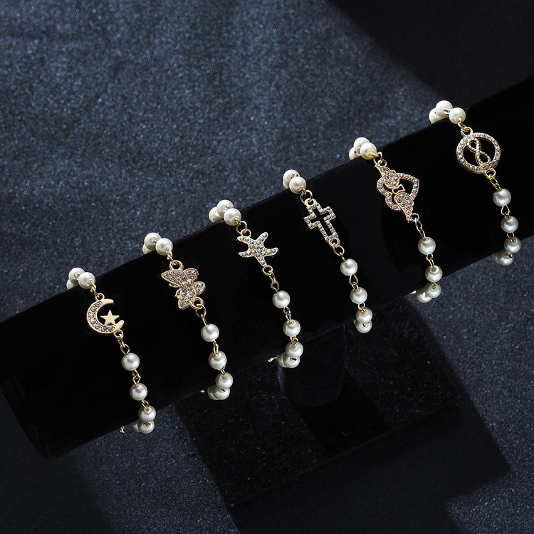 Adjustable Multi-Style Hollow Rhinestone Pearl Bracelet for Every Occasion - Image 29