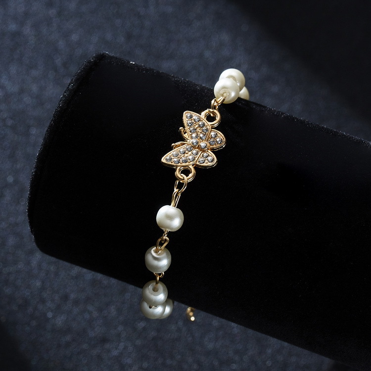 Adjustable Multi-Style Hollow Rhinestone Pearl Bracelet for Every Occasion - Image 38