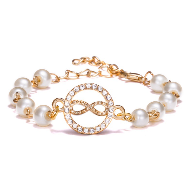 Adjustable Multi-Style Hollow Rhinestone Pearl Bracelet for Every Occasion - Image 46